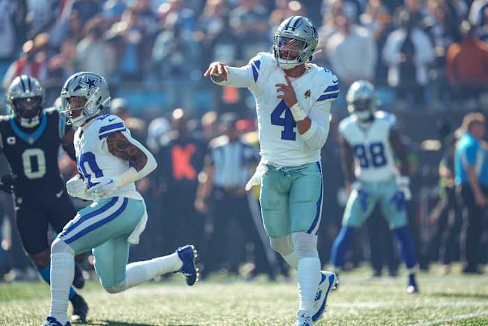 Dallas Cowboys quarterback Dak Prescott (right) and running back Tony Pollard.